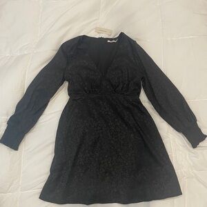 Women’s V-neck dress from Francesca’s, never worn and new with tags.